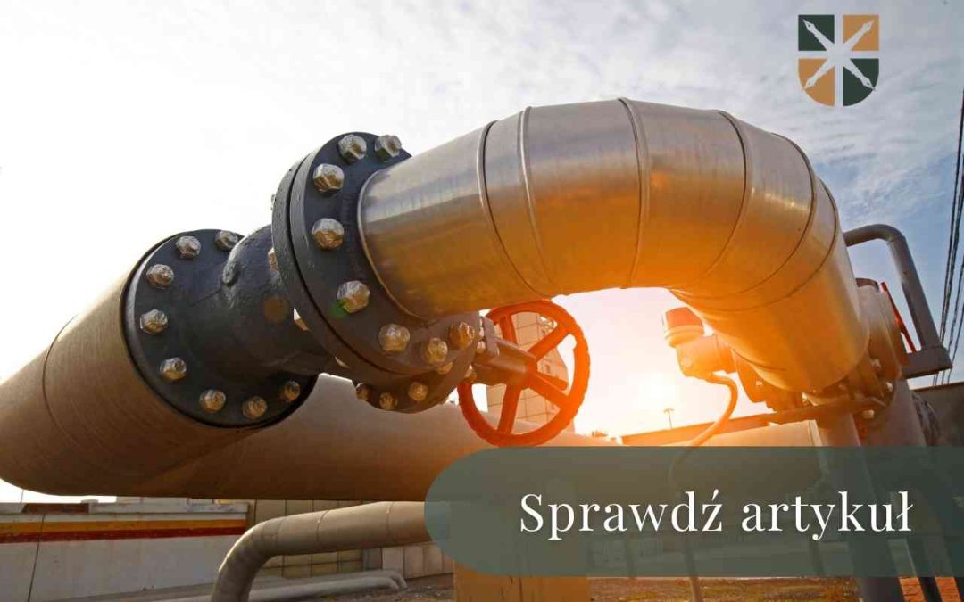 Przemysłowe rury ropociągu z zaworem odcinającym na tle nieba – infrastruktura ograniczająca korzystanie z gruntu.